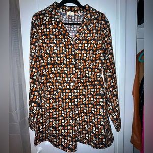 Entro 70s inspired long sleeved jumpsuit/romper with cream and rust daisy print